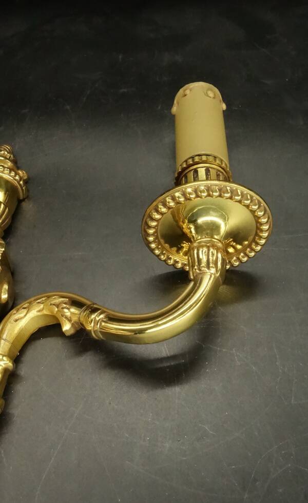 Pair of Louis XVI style urn and torch wall lights - gilt bronze