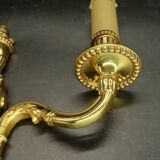 Pair of Louis XVI style urn and torch wall lights - gilt bronze