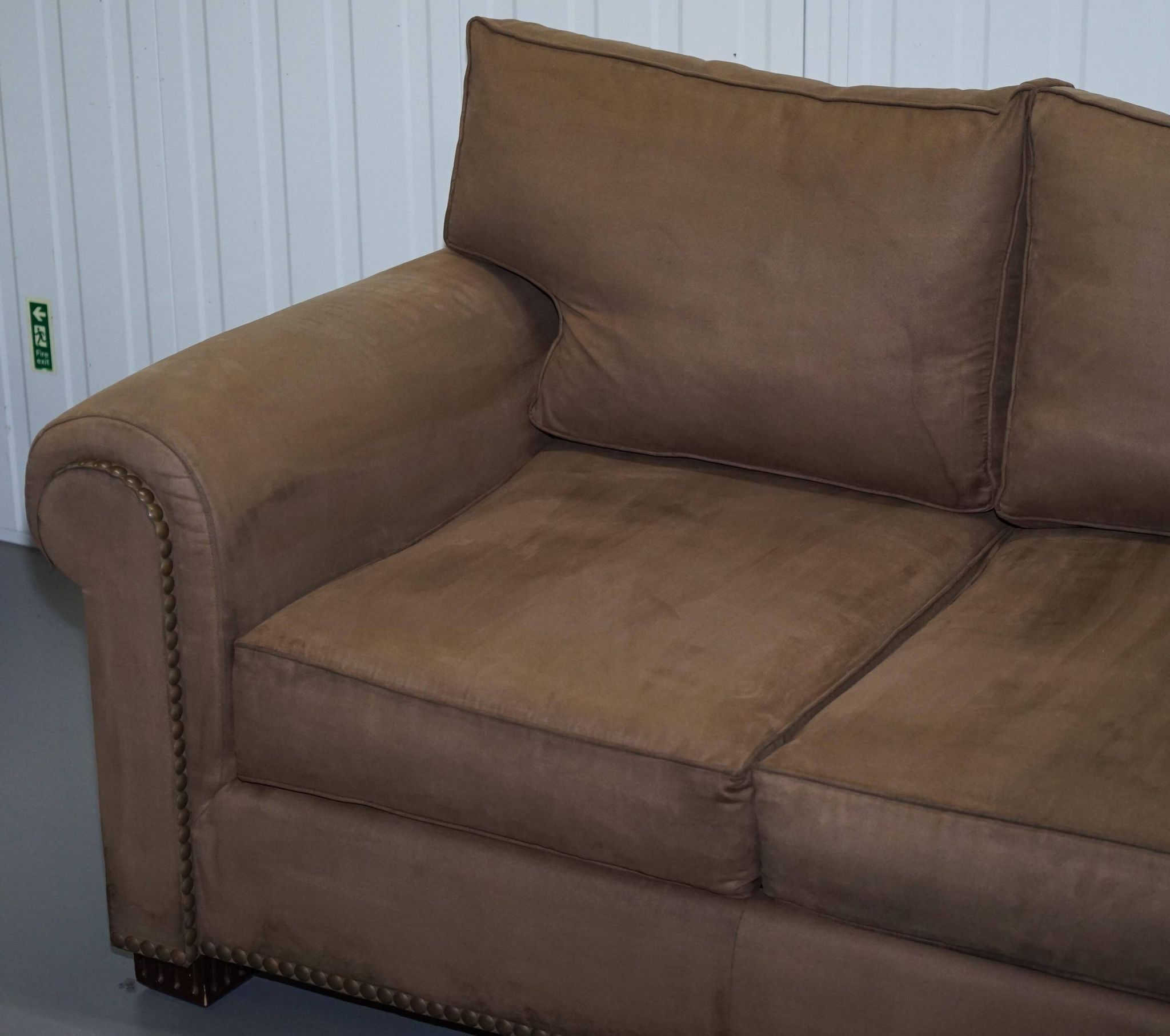 Ralph Lauren Jamaica velvet sofa pair with feather cushions.