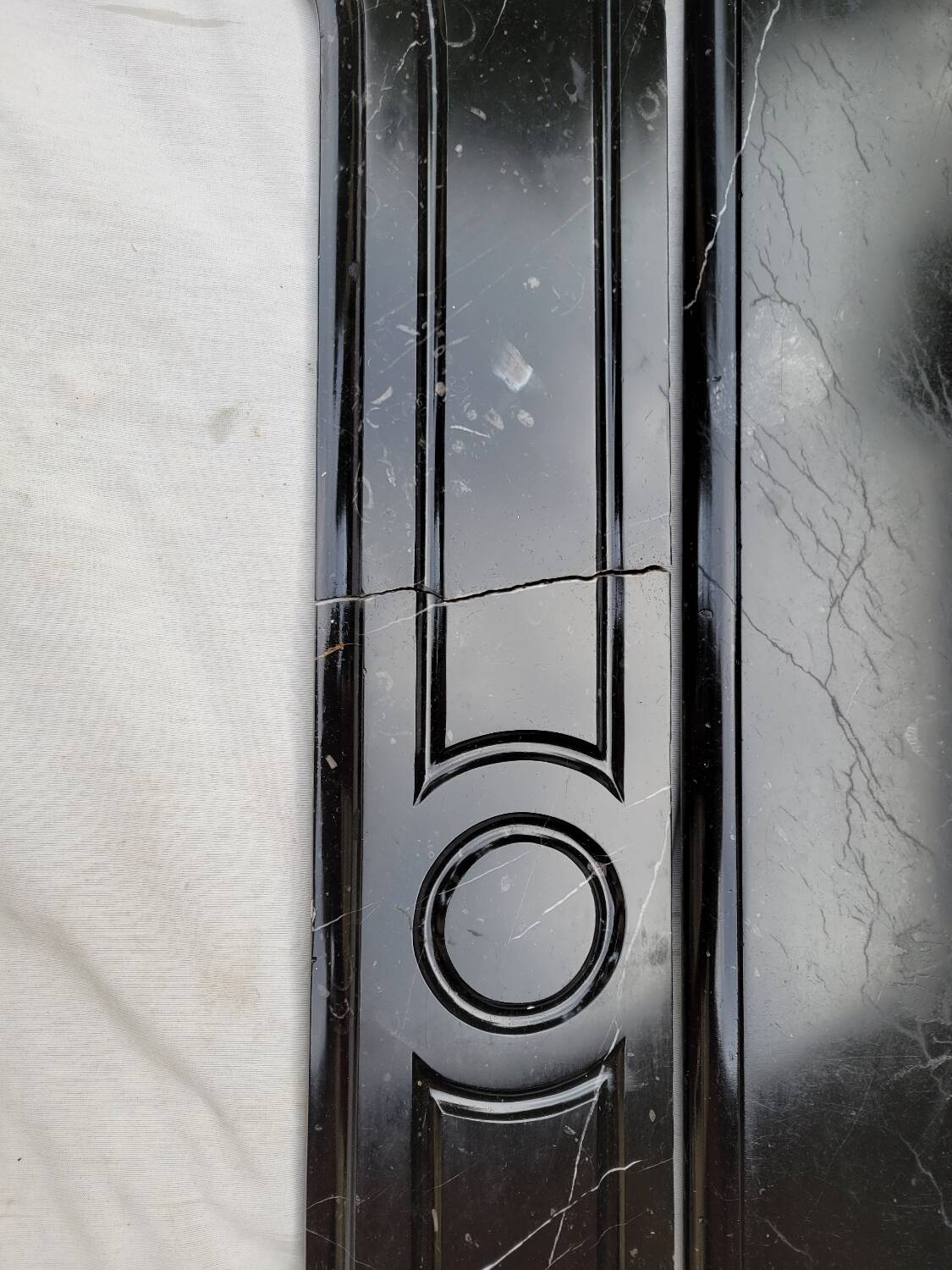 Pompadour fireplace with black marble modillions