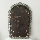 Old beveled wrought iron mirror late nineteenth century