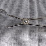 Silver metal cake pinch