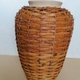 Rattan vase on ceramic