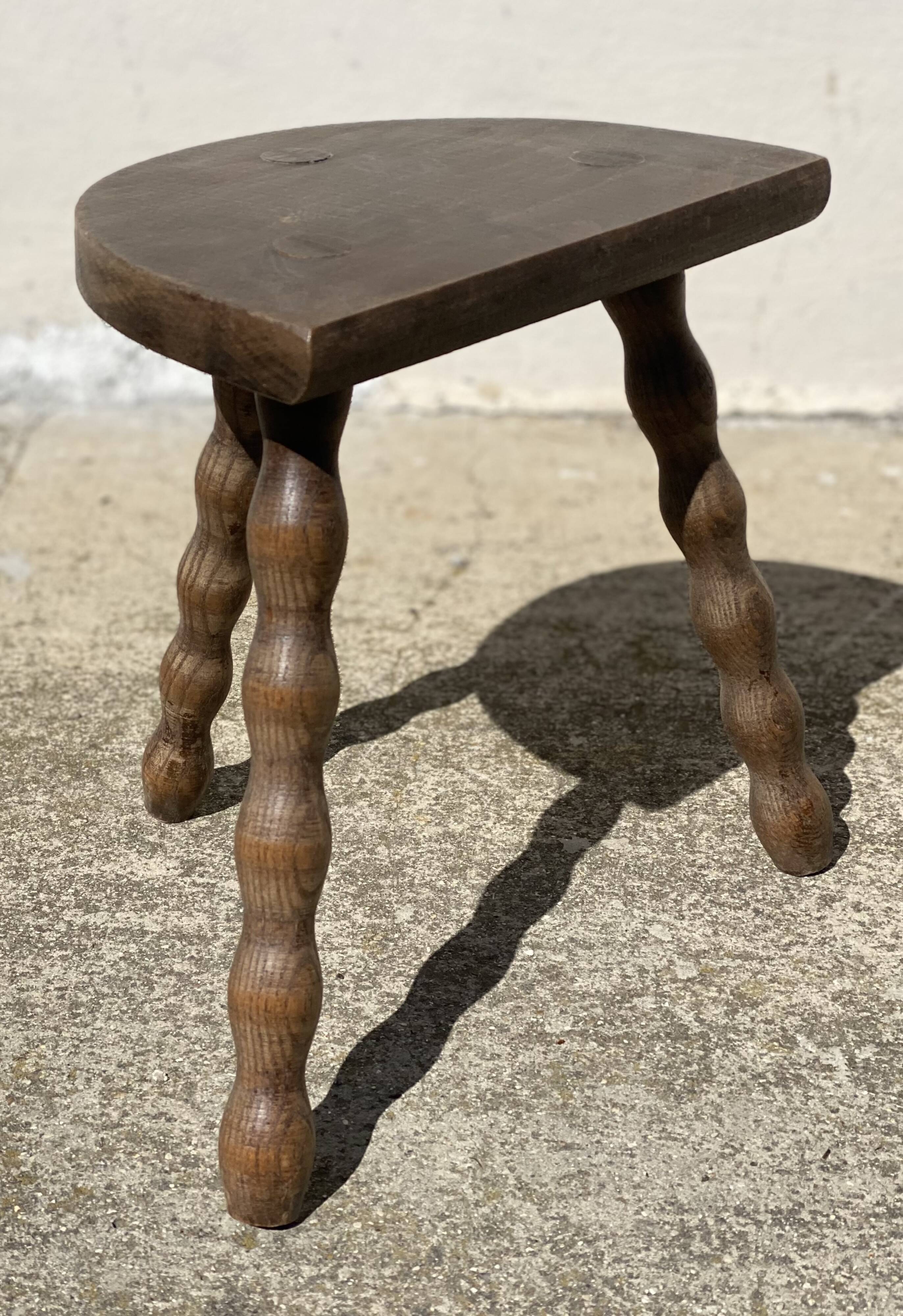 Vintage 1950s half-moon tripod stool