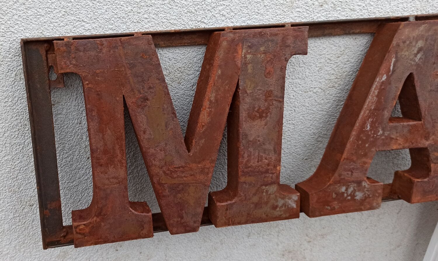 Rusty metal plate HOME