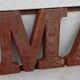 Rusty metal plate HOME