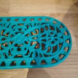 underside of the cast iron dish painted blue