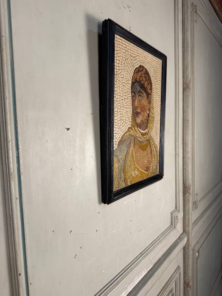 Portrait of a lady in marble mosaic in the antique style, circa 1880.