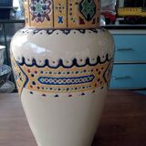 Ceramic vase decorated with multi-colored enamels