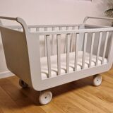 Renovated old cot with wheels