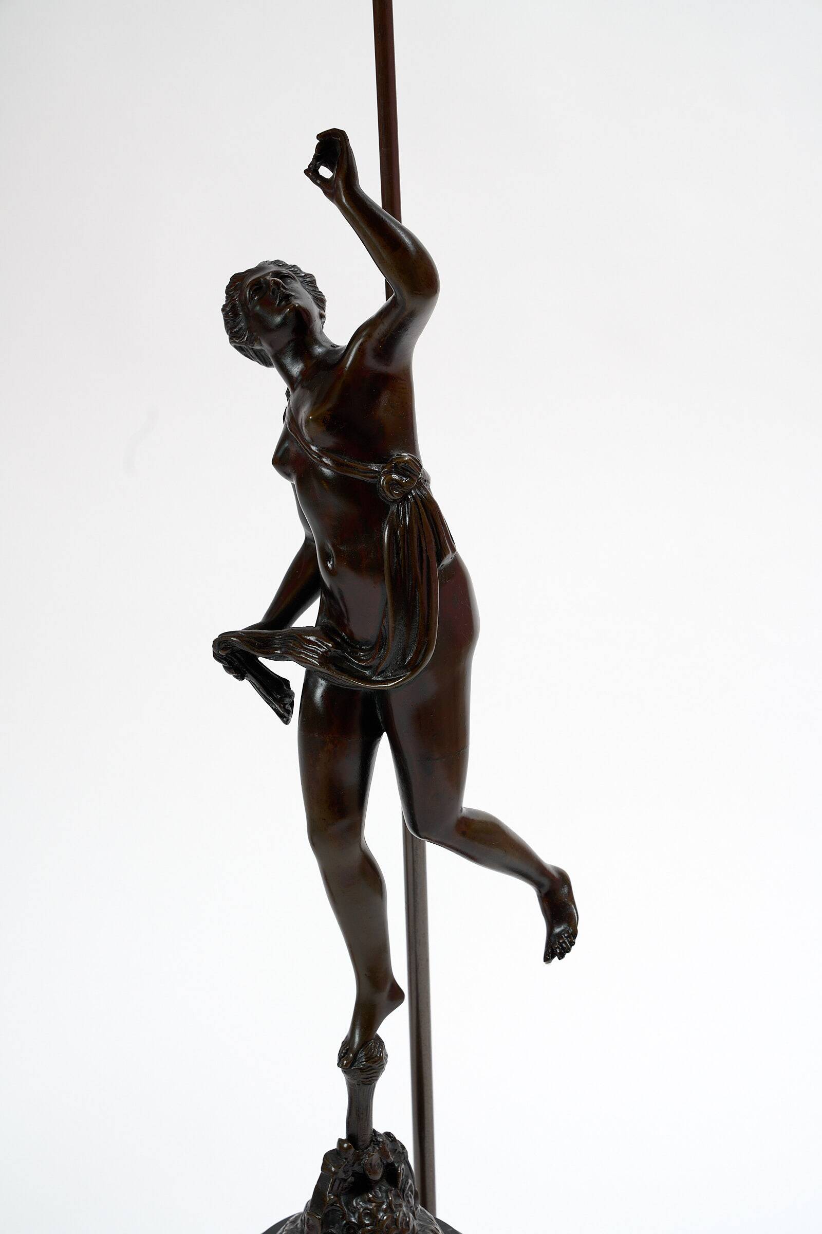 Pair of bronze lamps with red shades