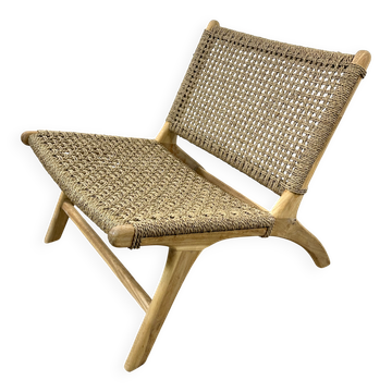 Lounge chair in solid teak and woven sea rush from the 2000s.