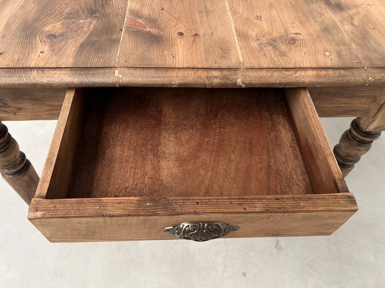 Antique farm table from the 1950s, with 3 drawers and turned legs