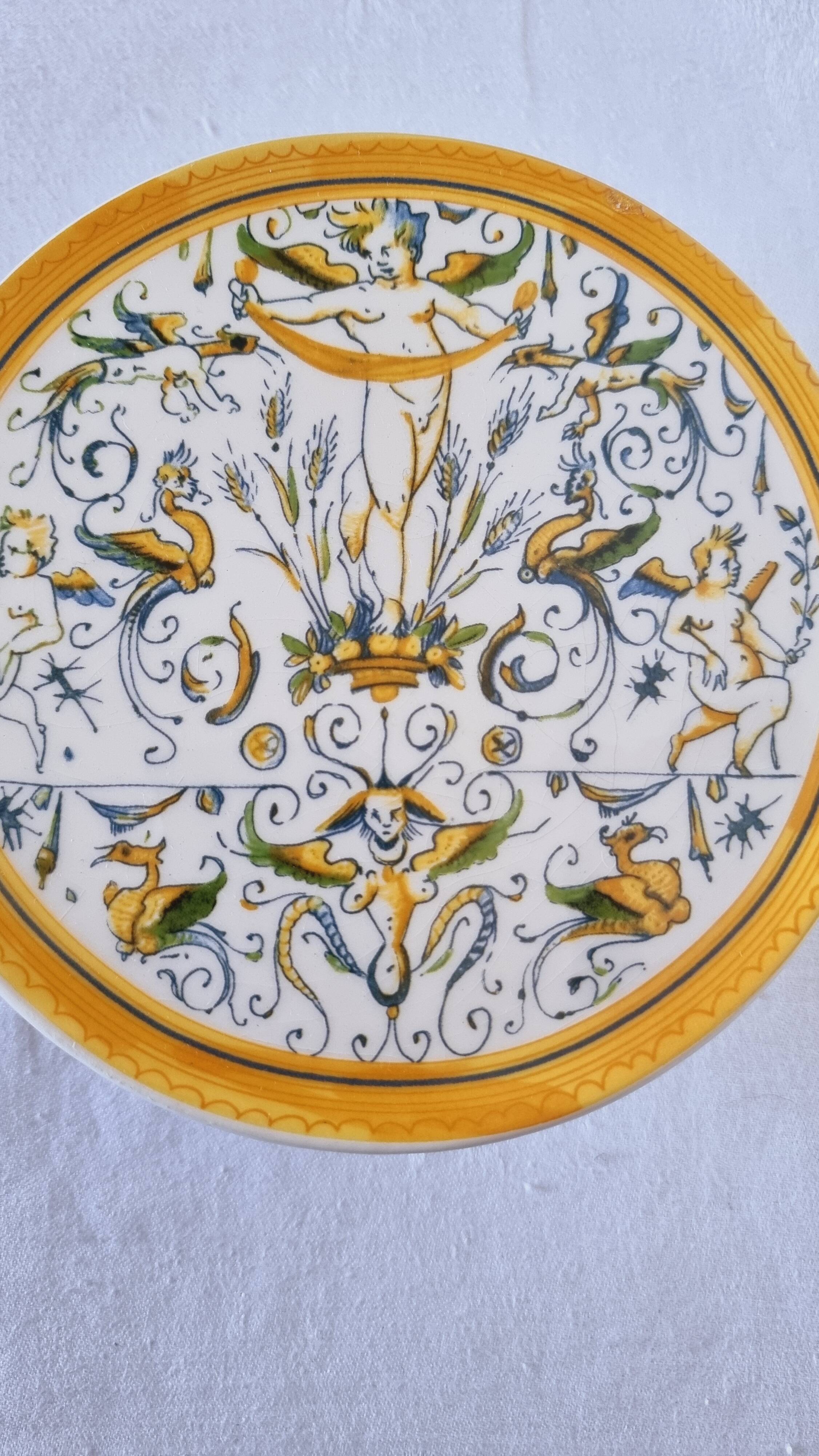 Vintage Italian raised plate in hand-painted ceramic.