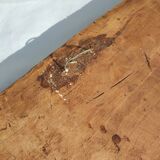 Bas-relief plaster scene of horses and a cart.