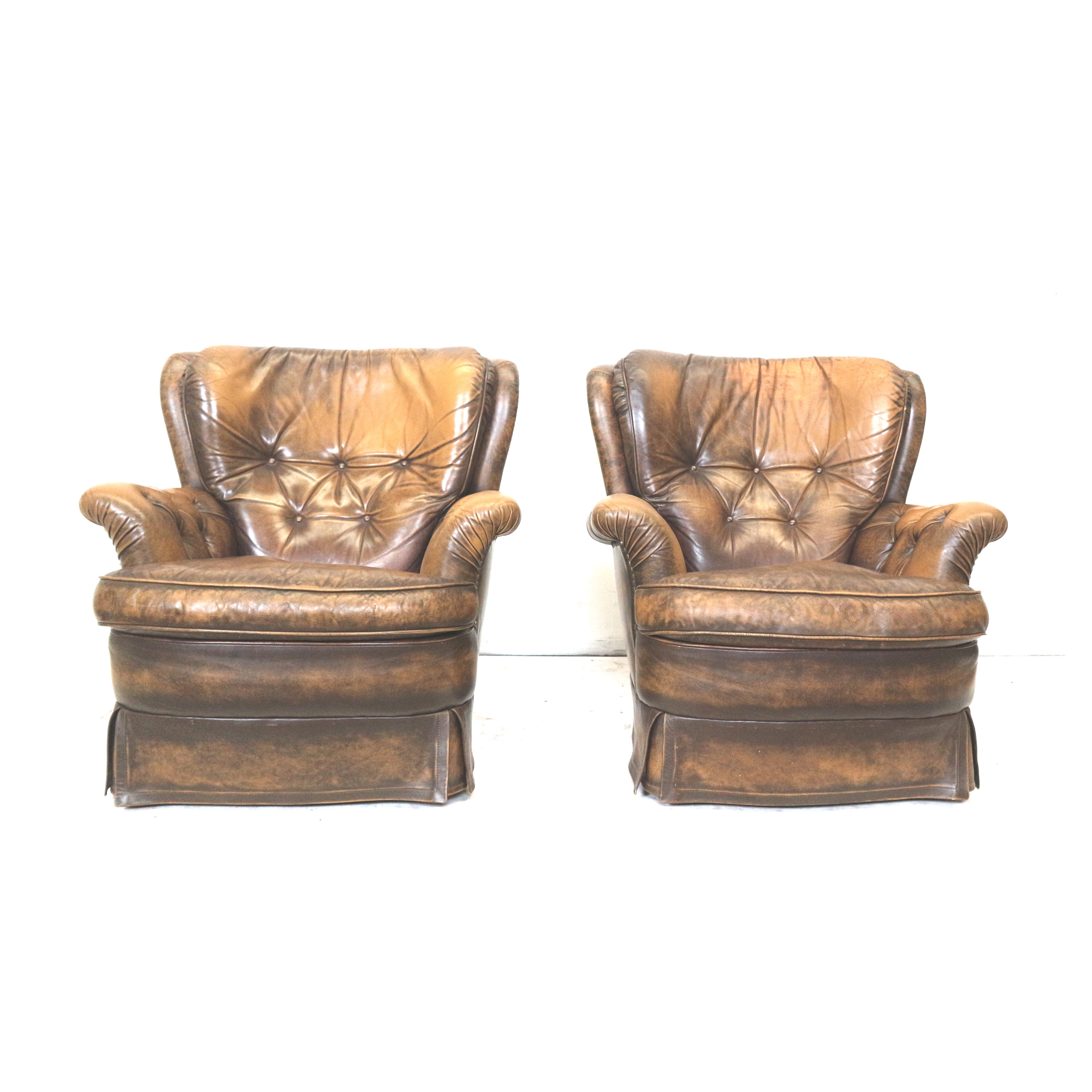 Set of 2 leather armchairs from the 1970s