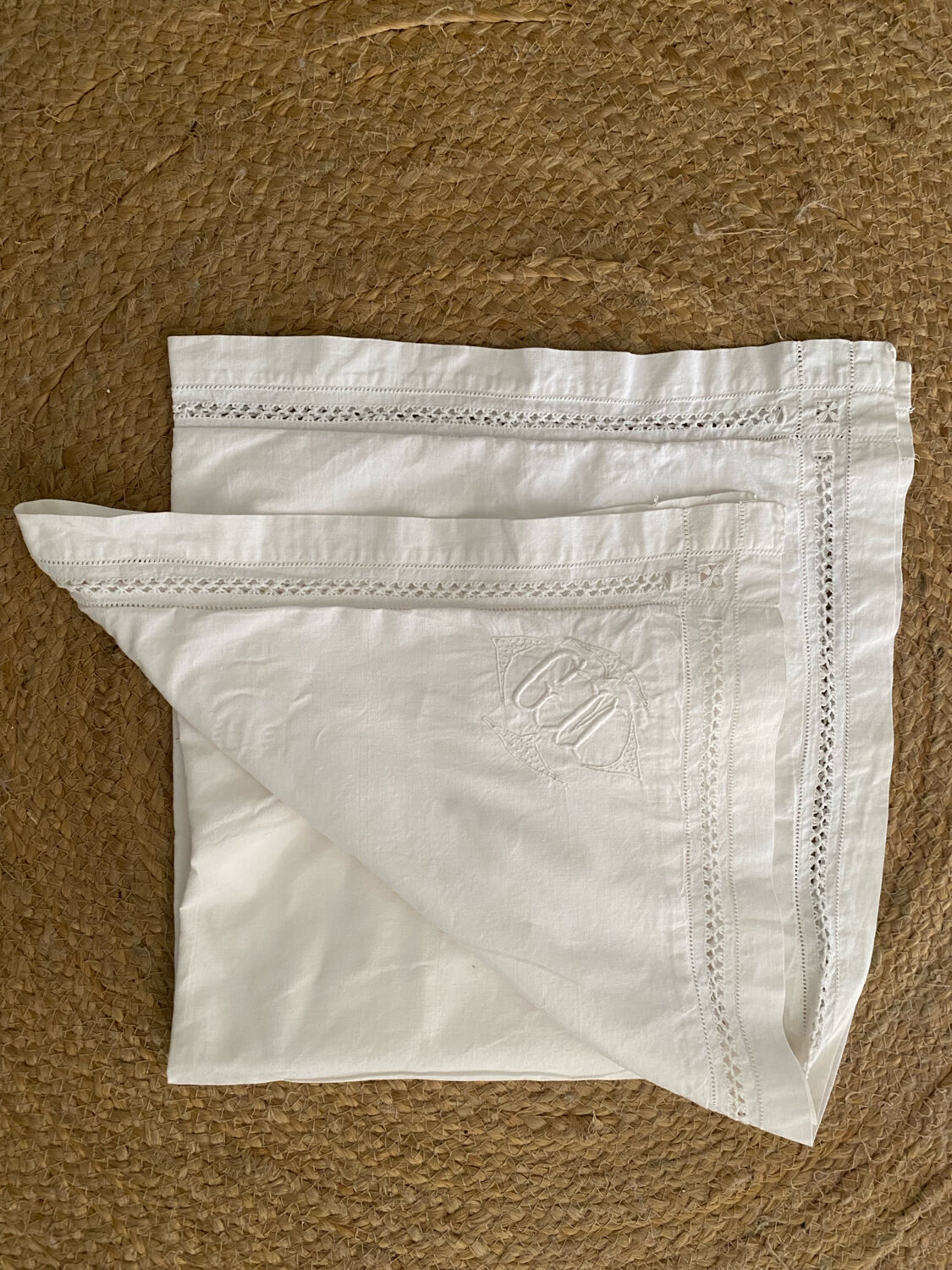 White cotton pillowcase with embroidery and monogram from the 1960s.