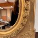 Louis XVI Style Medallion Mirror in gilded wood