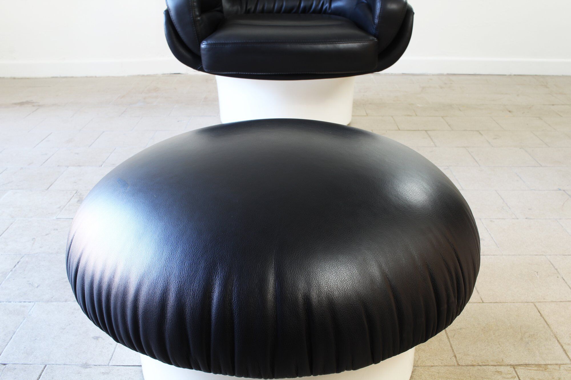 Joe Colombo Elda Chair + Ottoman in Black Leather and White Fiberglass Shell