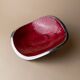 Red enameled steel bowl with textured interior and silver exterior; vintage Italian 1970s design