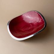 Red enameled steel bowl with textured interior and silver exterior; vintage Italian 1970s design