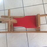 Rocking horse of the 70's in light wood