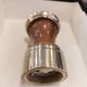 Varnished wood and brushed brass pepper mill