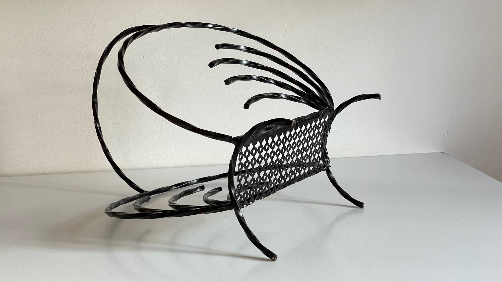 Vintage steel and rigitulle magazine holder