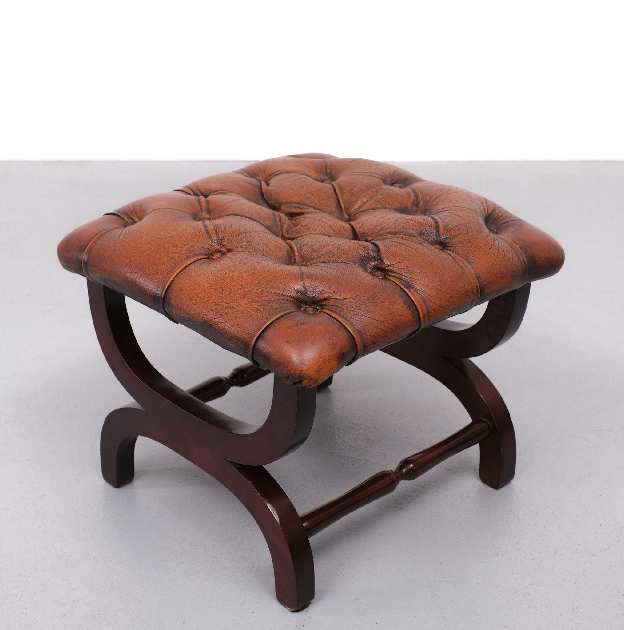 English country house style padded leather ottoman