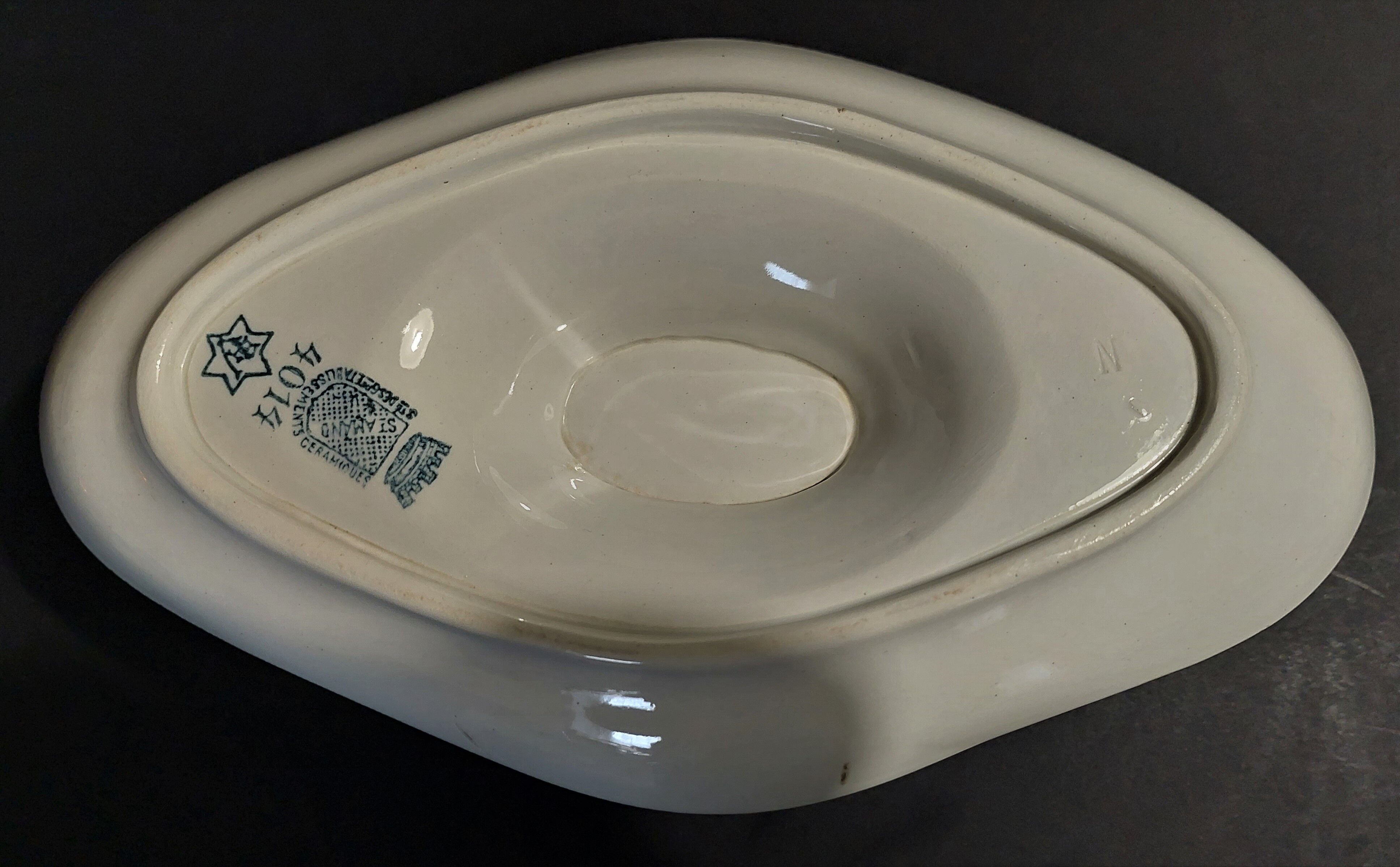 Faience sauce boat from Saint Amand