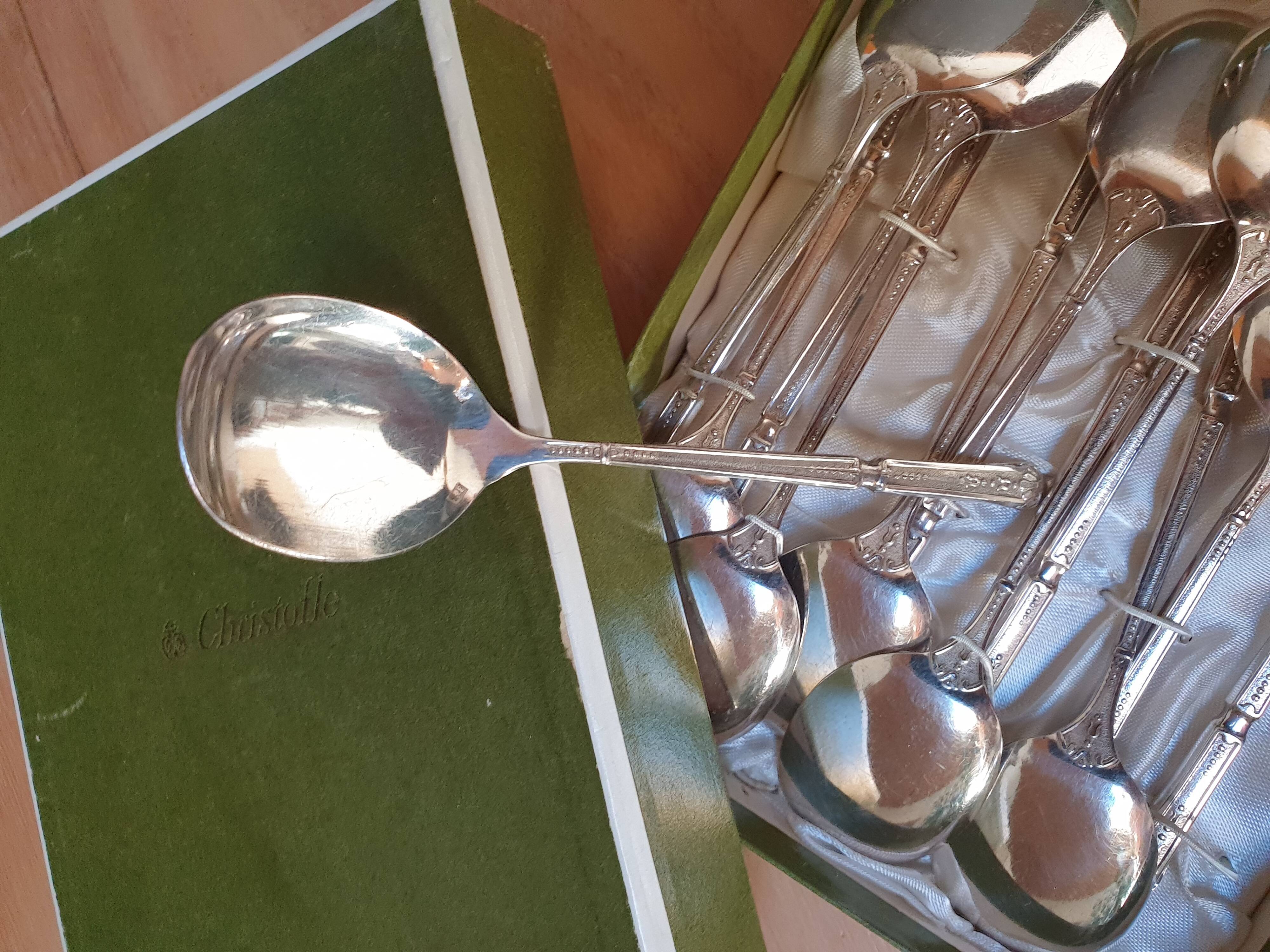 Punched silver metal ice spoons