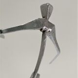 Sculptural metal paper press design 90s