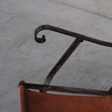 Pair of mid-century leather and metal folding armchairs