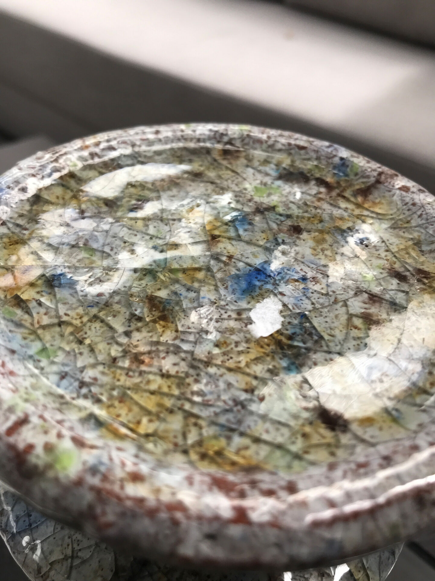 Ceramic candle holder in "Raku" style, blue-grey crackled.