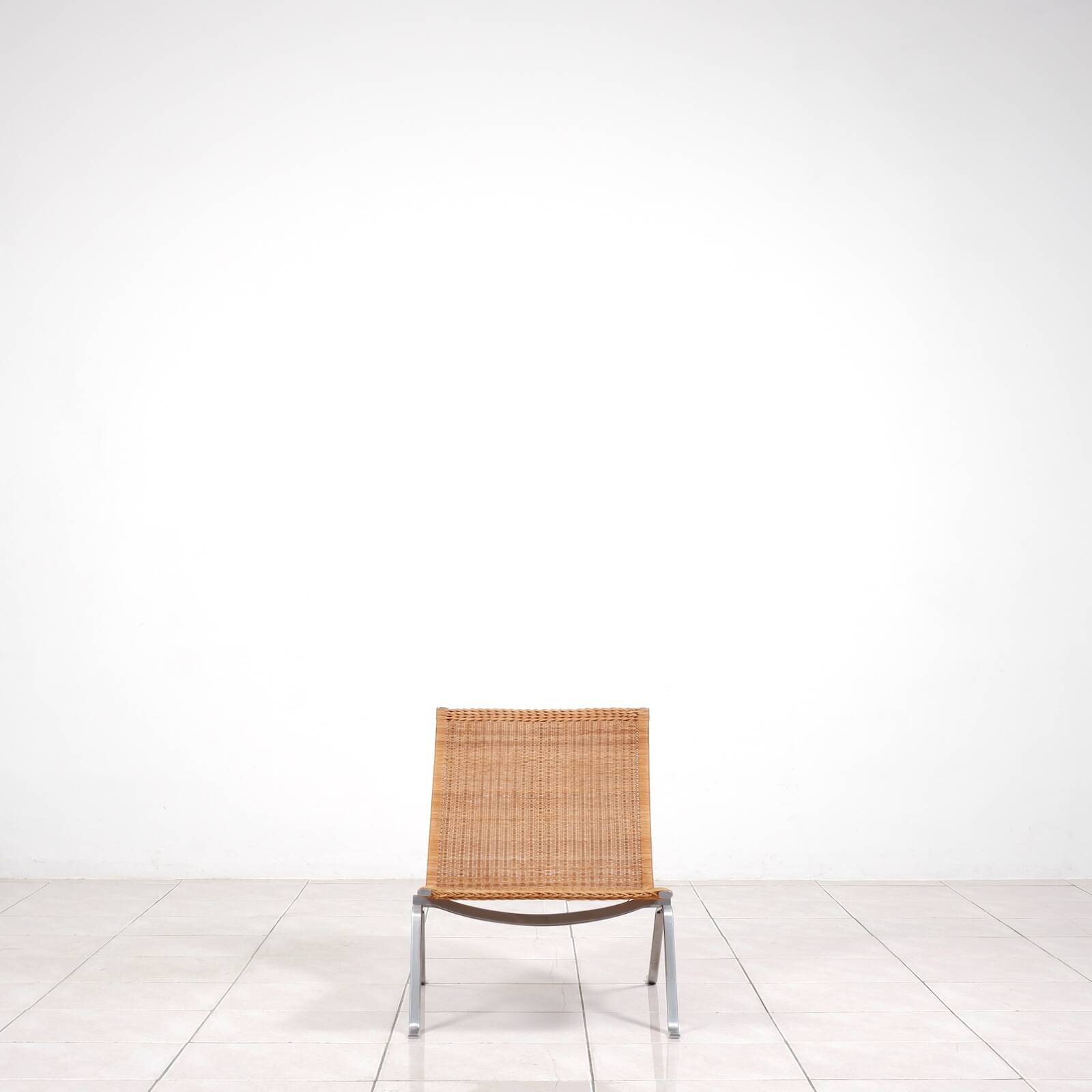 PK 22“ lounge chair in rattan by Poul Kjaerholm for E. Kold Christensen