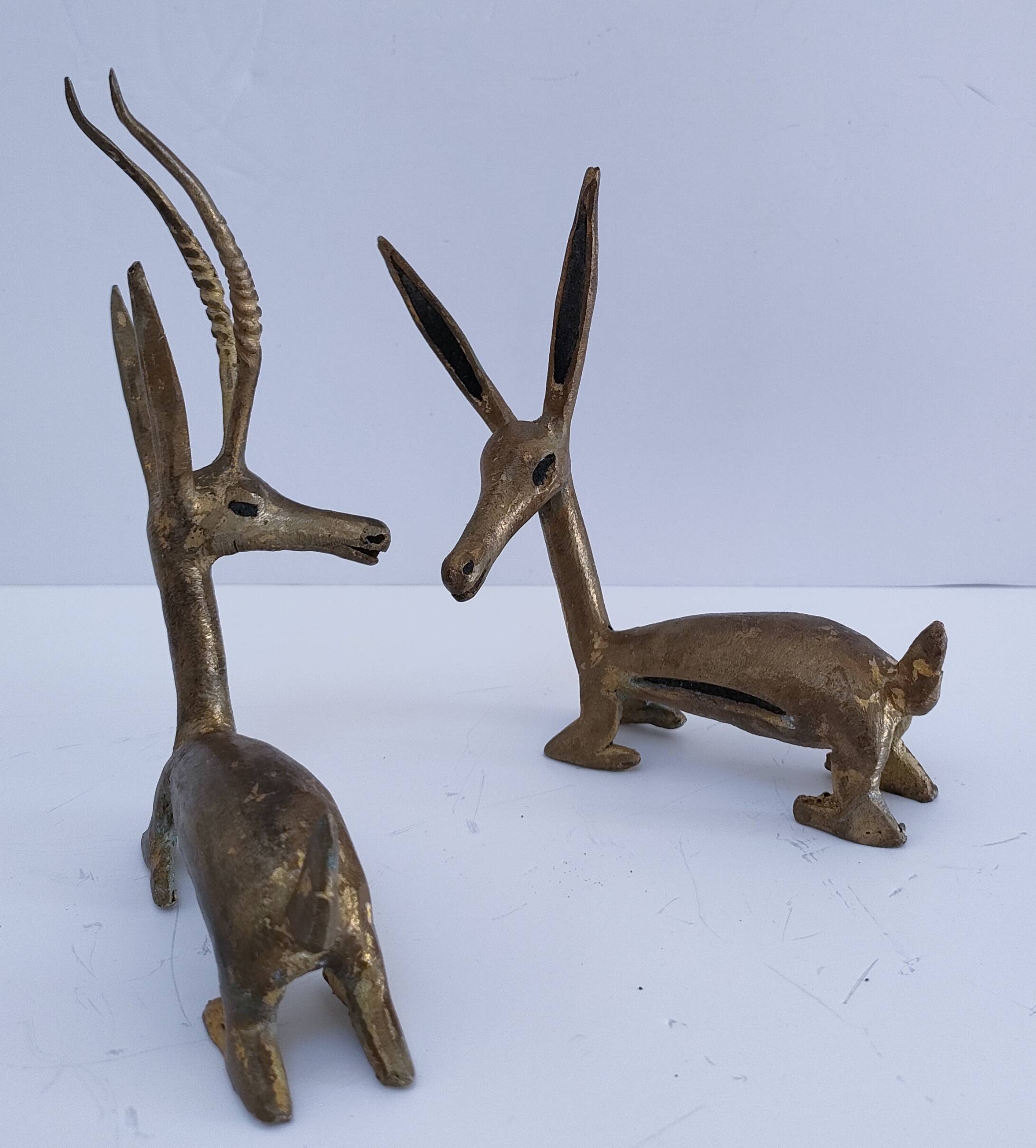 four vintage brass gazelle antelope sculptures