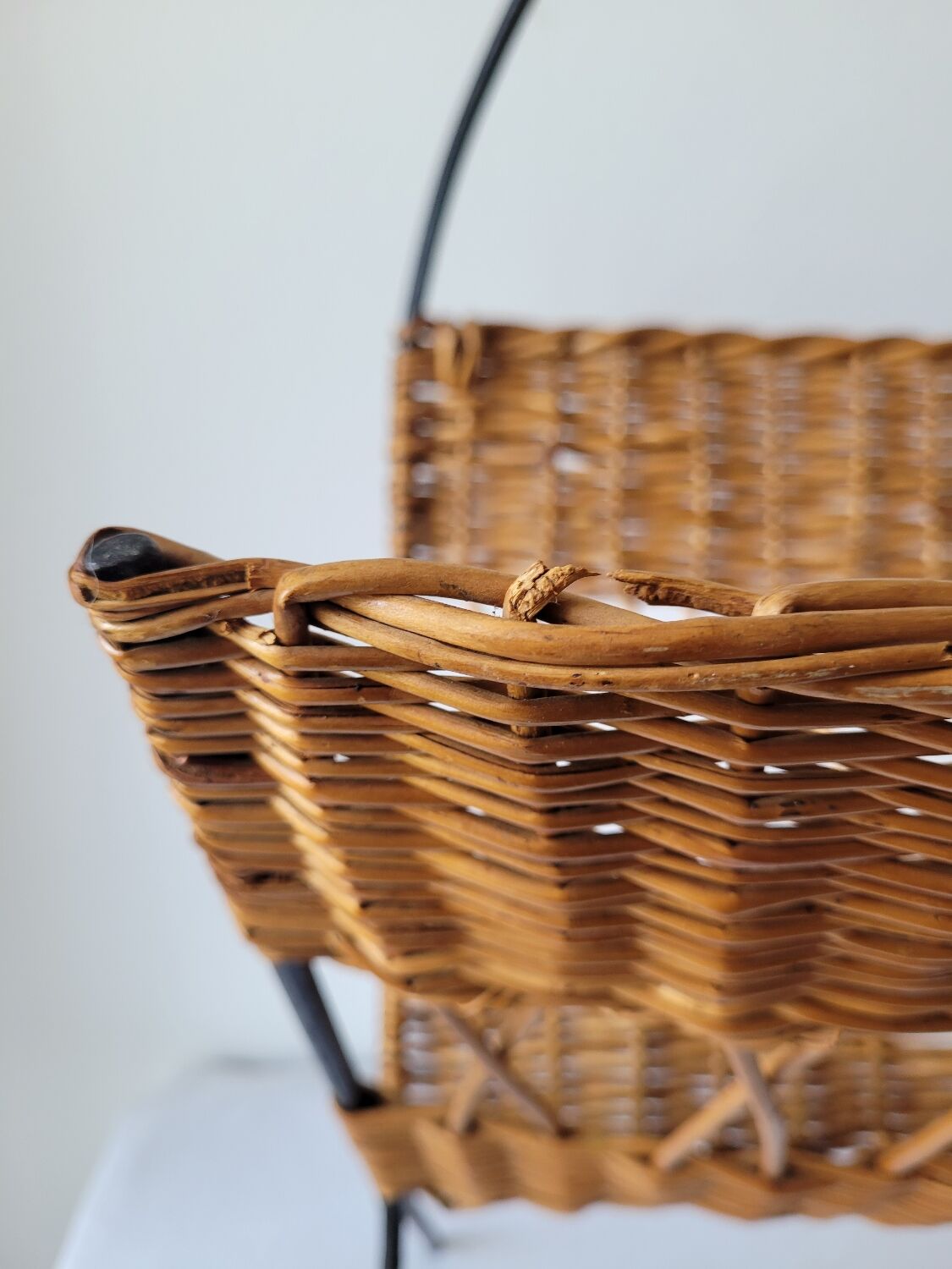 Metal and rattan magazine holder