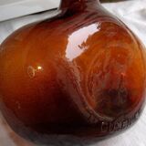 Ancienne bouteille Cusenier verre bullée marron