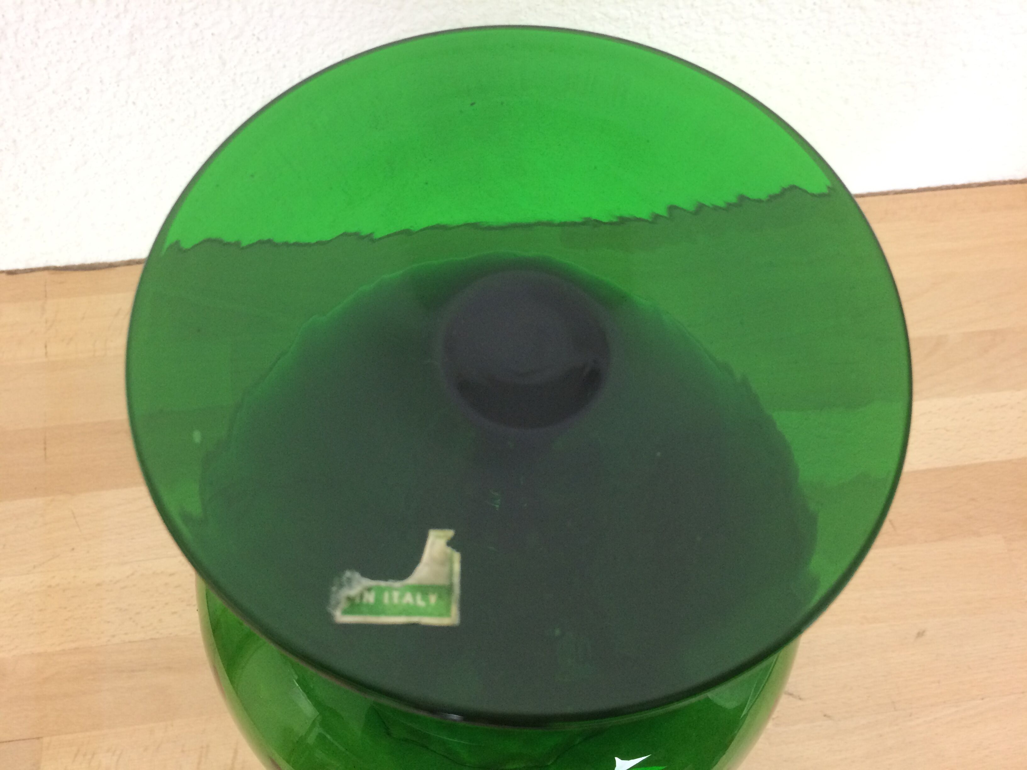 Green Empoli glass vase, cut on foot