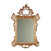 Antique carved and gilded wooden mirror, Italy, early 20th century.