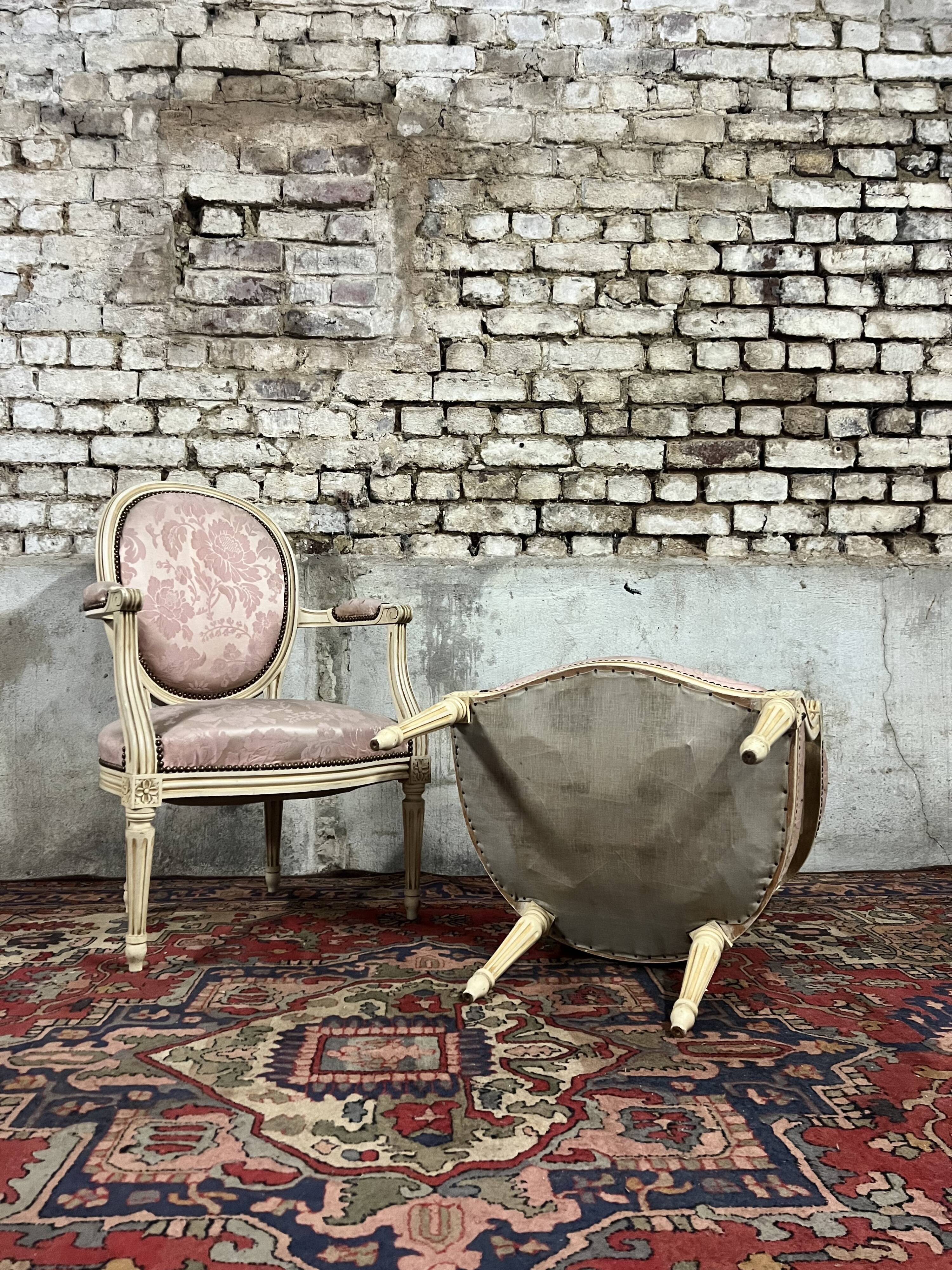 Pair of louis xvi style cream lacquered wood medallion back armchairs