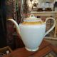 Coffee service 12 cups in white and gold porcelain
