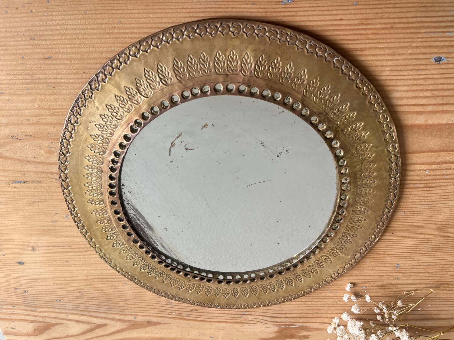 Round hammered brass mirror / vintage openwork