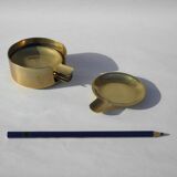 4 brass ashtrays in their 1970 case