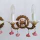 Pair of brass and porcelain wall lights