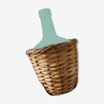 Pretty demijohn in her wicker basket vintage