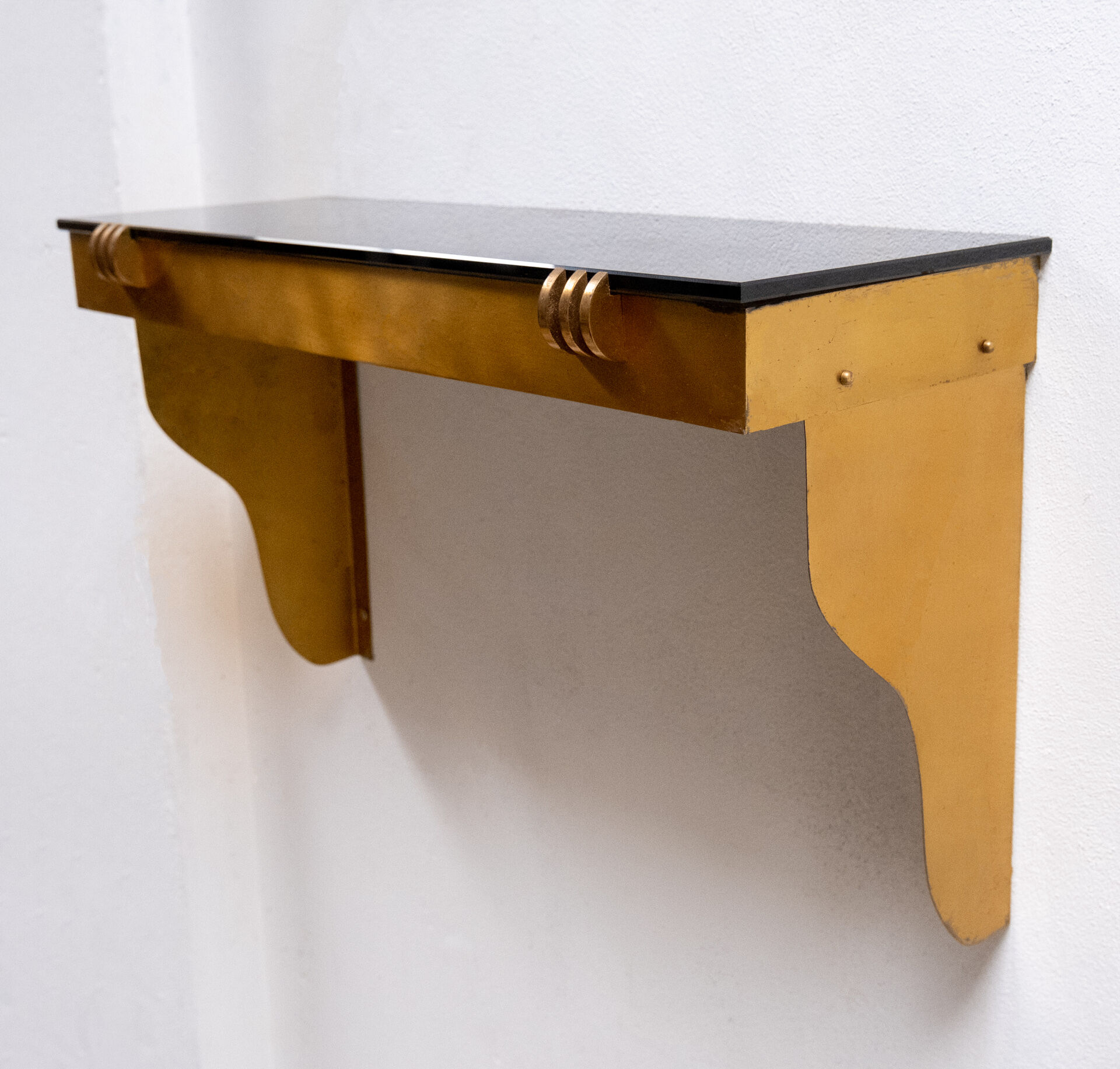 Art deco brass wall console Jean Pascaud