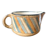 Antique milk jug.