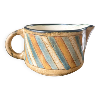 Antique milk jug.