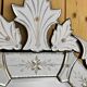 Venetian-style mirror with engraved floral decoration, mid-20th century.